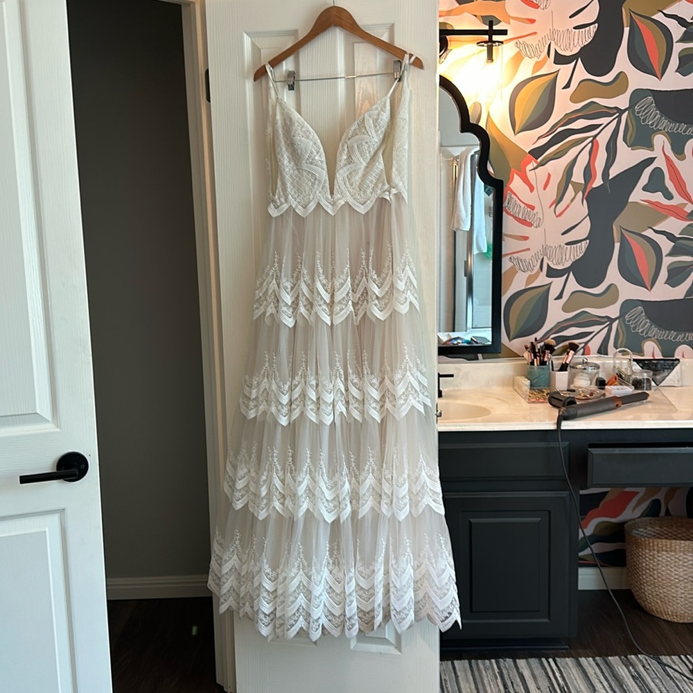 Wedding dress. Worn once. Bride is 5’5” and 130lbs.